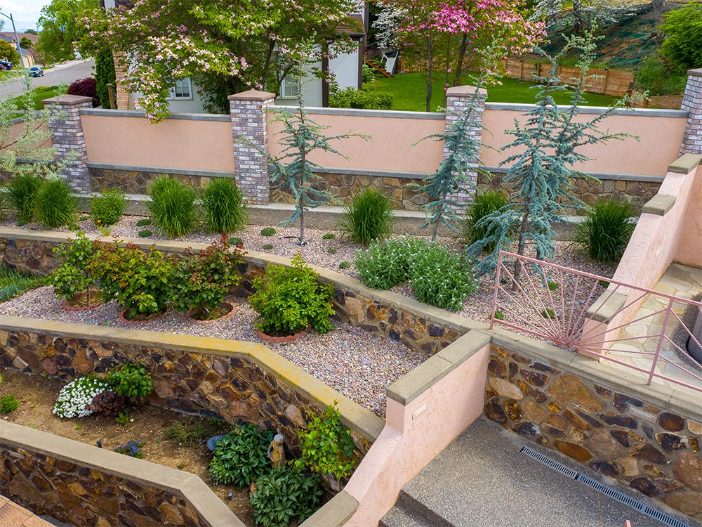 tiered stone walls with landscaping