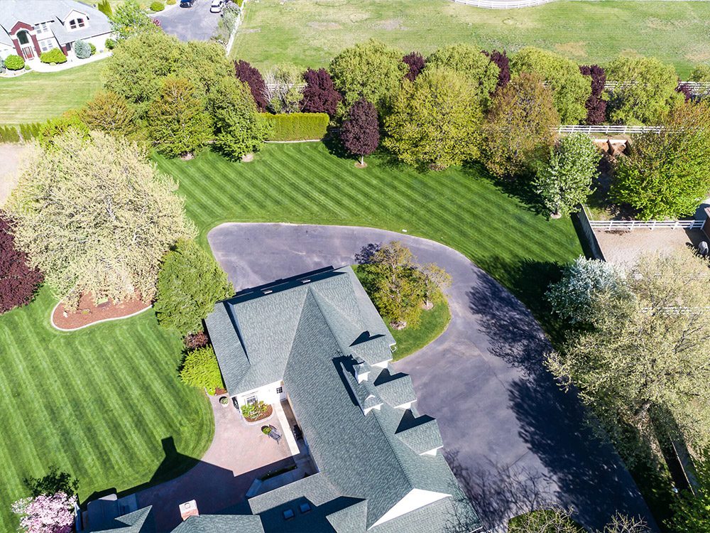 aerial view of beautifully landscaped and mowed lawn